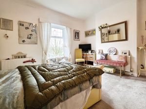 Bedroom One- click for photo gallery